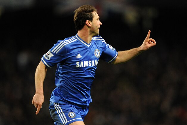 Chelsea's Branislav Ivanovic celebrates after he scores the first goal of the game for his side during their English Premier League soccer match against Manchester City at the Etihad stadium in Manchester, England, Monday Feb. 3, 2014. (AP Photo/Clint Hughes)