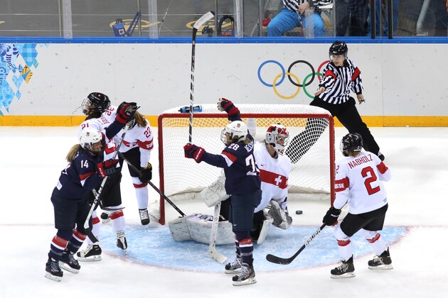 SOCHI, RUSSIA - FEBRUARY 10:  Amanda Kessel #28 of United States and Brianna Decker #14 of United States celebrate a goal during the Women's Ice Hockey Preliminary Round Group A game against Switzerland on day three of the Sochi 2014 Winter Olympics at Shayba Arena on February 10, 2014 in Sochi, Russia.  (Photo by Martin Rose/Getty Images)