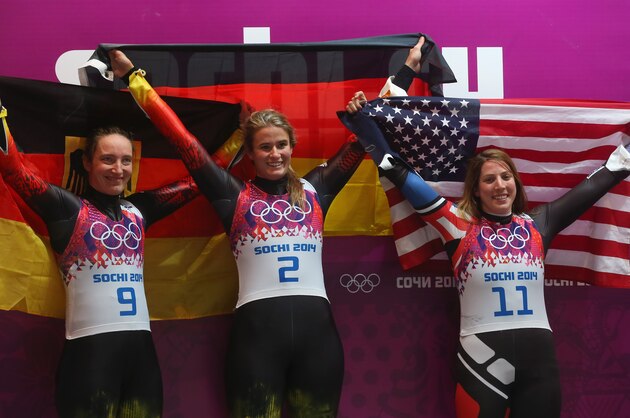 SOCHI, RUSSIA - FEBRUARY 11:  Gold medalist Natalie Geisenberger (C), silver medalist Tatjana Huefner (L) of Germany and bronze medalist Erin Hamlin of the United States celebrate after the Women's Luge Singles on Day 4 of the Sochi 2014 Winter Olympics at Sliding Center Sanki on February 11, 2014 in Sochi, Russia.  (Photo by Alexander Hassenstein/Getty Images)