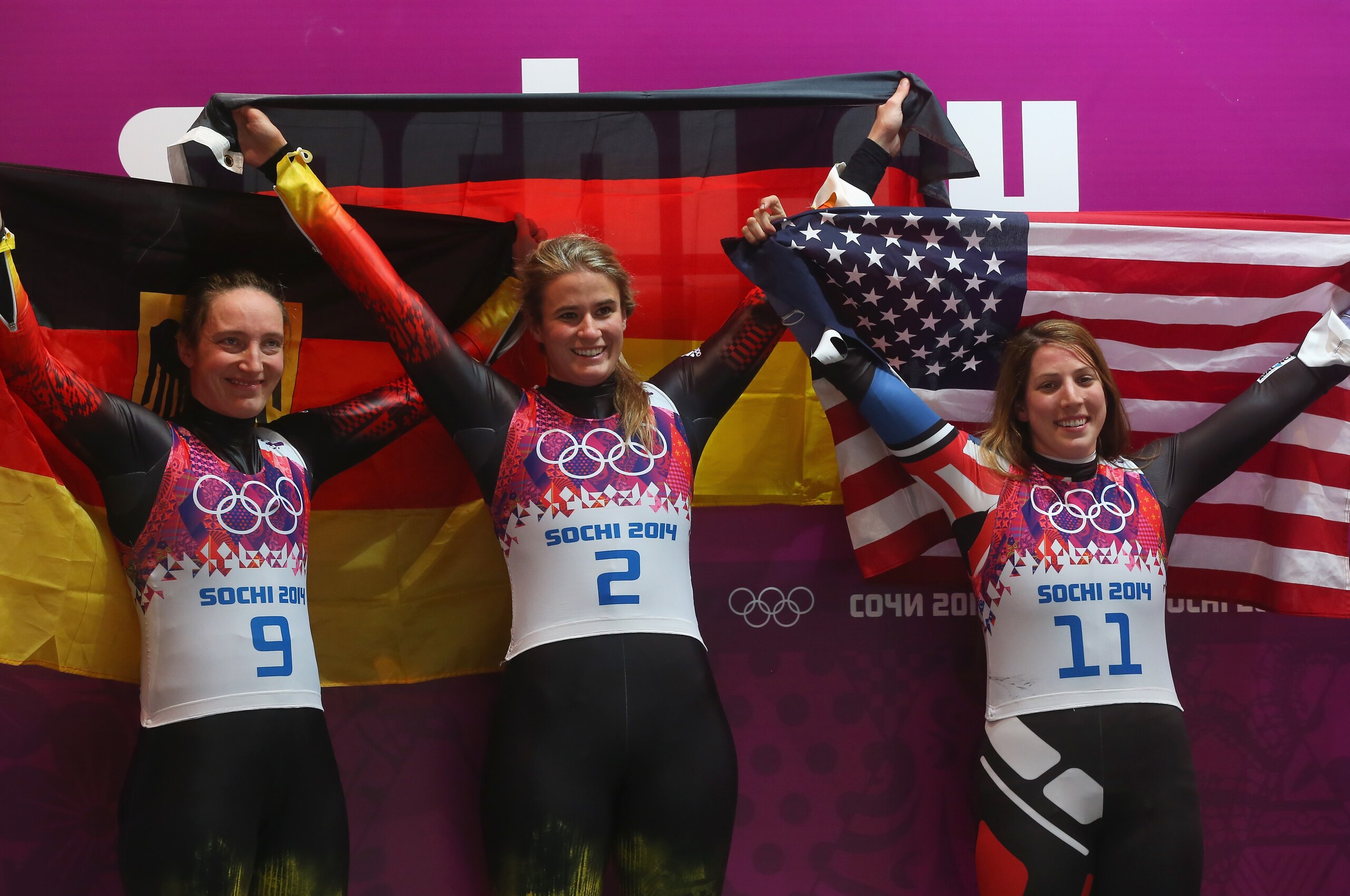 SOCHI, RUSSIA - FEBRUARY 11:  Gold medalist Natalie Geisenberger (C), silver medalist Tatjana Huefner (L) of Germany and bronze medalist Erin Hamlin of the United States celebrate after the Women's Luge Singles on Day 4 of the Sochi 2014 Winter Olympics at Sliding Center Sanki on February 11, 2014 in Sochi, Russia.  (Photo by Alexander Hassenstein/Getty Images)