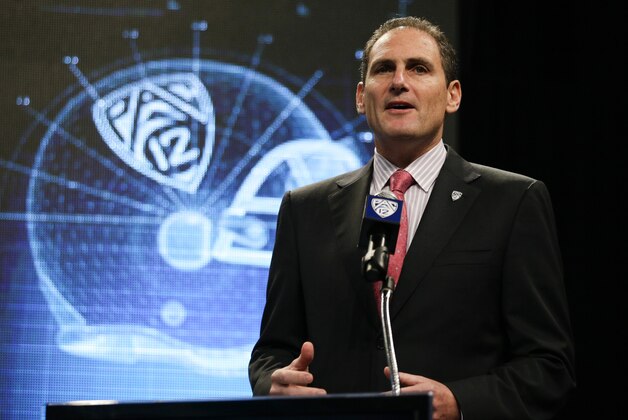 Pac-12 Commissioner Larry Scott talks to the media during the NCAA college football Pac-12 Media Day on Friday, July 26, 2013, in Culver City, Calif. (AP Photo/Jae C. Hong)