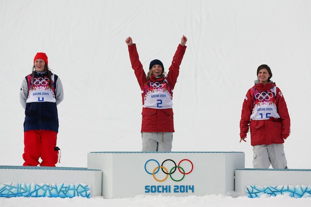 SOCHI, RUSSIA - FEBRUARY 11:  (L-R) Silver medalist Devin Logan of the United States, gold medalist Dara Howell of Canada and bronze medalist Kim Lamarre of Canada celebrate during the flower ceremony for the Freestyle Skiing Women's Ski Slopestyle Finals on day four of the Sochi 2014 Winter Olympics at Rosa Khutor Extreme Park on February 11, 2014 in Sochi, Russia.  (Photo by Mike Ehrmann/Getty Images)