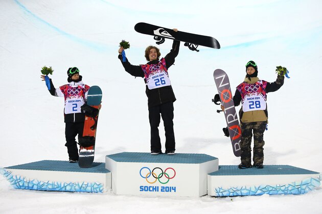 SOCHI, RUSSIA - FEBRUARY 11:  (L-R) Silver medalist Ayumu Hirano of Japan, gold medalist Iouri Podladtchikov of Switzerland and bronze medalist Taku Hiraoka of Japan celebrate on the podium during the flower ceremony for the Snowboard Men's Halfpipe Finals on day four of the Sochi 2014 Winter Olympics at Rosa Khutor Extreme Park on February 11, 2014 in Sochi, Russia.  (Photo by Al Bello/Getty Images)