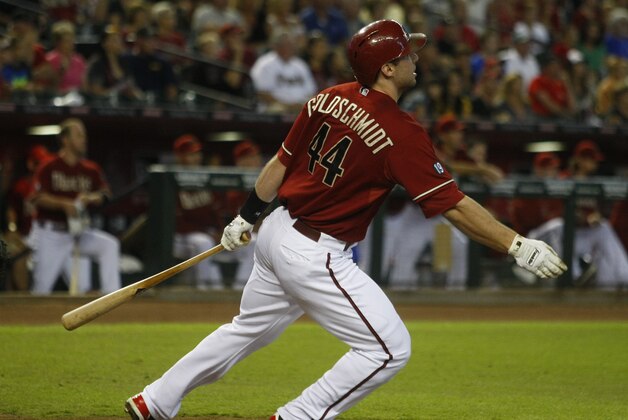 Arizona Diamondbacks Paul Goldschmidt (44) hits a sacrifice fly out in the first inning during an MLB National League baseball game against the Washington Nationals on Sunday, Sept 29, 2013, in Phoenix. (AP Photo/Rick Scuteri)