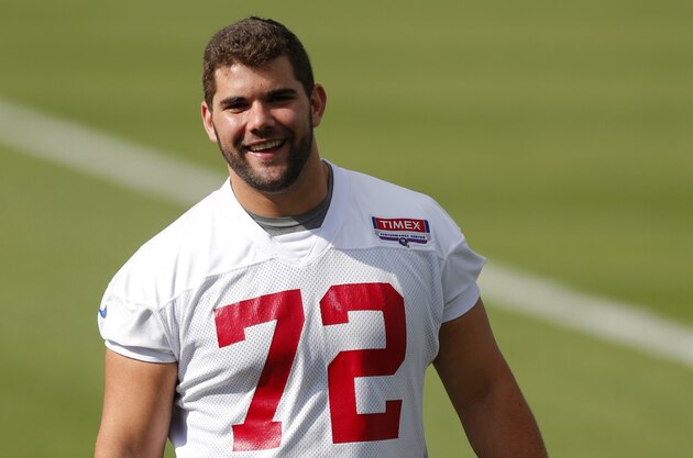 Jun 11, 2013; East Rutherford, NJ, USA; New York Giants offensive tackle Justin Pugh (72) reacts during minicamp the Giants Timex Performance Center. Mandatory Credit: Jim O'Connor-USA TODAY Sports