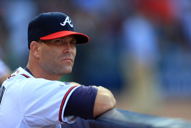 Oct 4, 2013; Atlanta, GA, USA; Atlanta Braves injured pitcher Tim Hudson in the dugout during game two of the National League divisional series playoff baseball game against the Los Angeles Dodgers at Turner Field. Mandatory Credit: Daniel Shirey-USA TODAY Sports