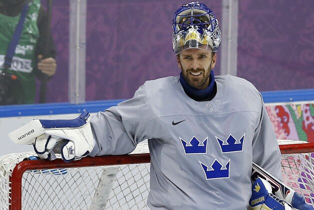 Sweden goaltender Henrik Lundqvist takes a break during a training session inside the Bolshoy Ice Dome at the 2014 Winter Olympics, Tuesday, Feb. 11, 2014, in Sochi, Russia. (AP Photo/Julie Jacobson)