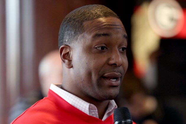 Georgia running backs coach Bryan McClendon answers questions from fans about Georgia's recruiting class on national signing day Wednesday, Feb. 5, 2014, in Athens, Ga. (AP Photo/Jason Getz)
