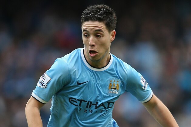 MANCHESTER, ENGLAND - DECEMBER 14:  Samir Nasri of Manchester City in action during the Barclays Premier League match between Manchester City and Arsenal at Etihad Stadium  on December 14, 2013 in Manchester, England.  (Photo by Clive Brunskill/Getty Images)