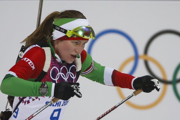 Belarus' Darya Domracheva skis on her way to win the gold medal in the women's biathlon 10k pursuit, at the 2014 Winter Olympics, Tuesday, Feb. 11, 2014, in Krasnaya Polyana, Russia. (AP Photo/Felipe Dana)