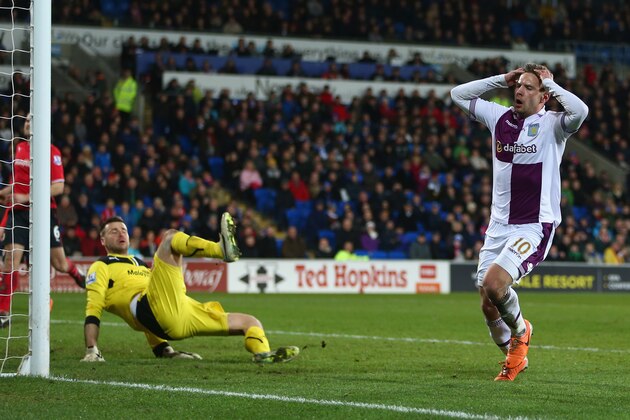 CARDIFF, WALES - FEBRUARY 11:  David Marshall (L) of Cardiff City makesr a  last minute save from Andreas Weimann (R) during the Barclays Premier League match between Cardiff City and Aston Villa at the Cardiff City Stadium on February 11, 2014 in Cardiff, Wales.  (Photo by Michael Steele/Getty Images)