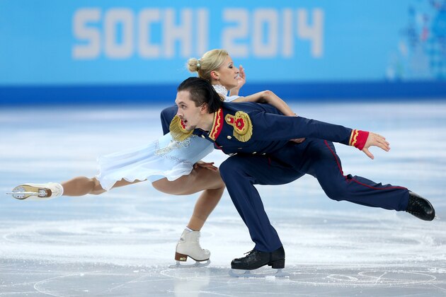 SOCHI, RUSSIA - FEBRUARY 11: Tatiana Volosozhar and Maxim Trankov of Russia compete during the Figure Skating Pairs Short Program on day four of the Sochi 2014 Winter Olympics at Iceberg Skating Palace on February 11, 2014 in Sochi, Russia. (Photo by Paul Gilham/Getty Images) SOCHI, RUSSIA - FEBRUARY 11: Tatiana Volosozhar and Maxim Trankov of Russia compete during the Figure Skating Pairs Short Program on day four of the Sochi 2014 Winter Olympics at Iceberg Skating Palace on February 11, 2014 in Sochi, Russia. (Photo by Paul Gilham/Getty Images)