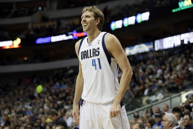 Dallas Mavericks power forward Dirk Nowitzki (41) of Germany smiles after being fouled during an NBA basketball game against the Detroit Pistons, Sunday, Jan. 26, 2014, in Dallas. The Mavericks won 116-106. (AP Photo/Tony Gutierrez)
