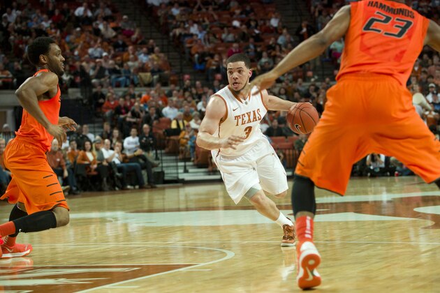 AUSTIN, TX - FEBRUARY 11: Javan Felix #3 of the Texas Longhorns drives to the basket against the Oklahoma State Cowboys on February 11, 2014 at the Frank Erwin Center in Austin, Texas.  (Photo by Cooper Neill/Getty Images)