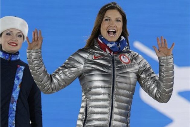 Women's super combined bronze medalist Julia Mancuso of the United States waves during the medals ceremony at the 2014 Winter Olympics, Monday, Feb. 10, 2014, in Sochi, Russia. (AP Photo/Morry Gash) Women's super combined bronze medalist Julia Mancuso of the United States waves during the medals ceremony at the 2014 Winter Olympics, Monday, Feb. 10, 2014, in Sochi, Russia. (AP Photo/Morry Gash)