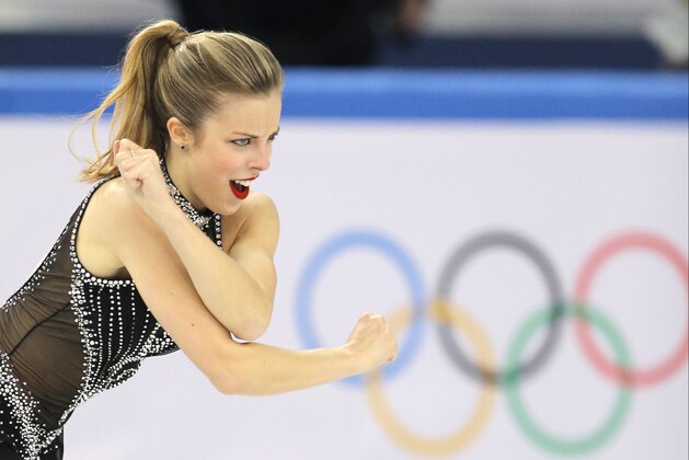 Ashley Wagner of the United States competes in the women's team short program figure skating competition at the Iceberg Skating Palace during the 2014 Winter Olympics, Saturday, Feb. 8, 2014, in Sochi, Russia. (AP Photo/Vadim Ghirda)