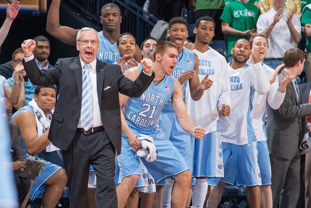 Feb 8, 2014; South Bend, IN, USA; North Carolina Tar Heels head coach Roy Williams and the North Carolina bench react in the first half against the Notre Dame Fighting Irish at the Purcell Pavilion. Mandatory Credit: Matt Cashore-USA TODAY Sports