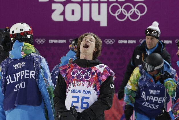 Switzerland's Iouri Podladtchikov celebrates after his half pipe run during the men's snowboard halfpipe final at the Rosa Khutor Extreme Park, at the 2014 Winter Olympics, Tuesday, Feb. 11, 2014, in Krasnaya Polyana, Russia. Podladtchikov won the gold medal. (AP Photo/Andy Wong)