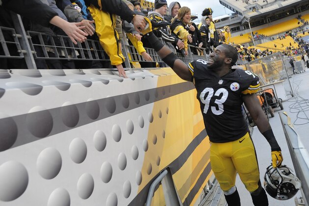 Pittsburgh Steelers outside linebacker Jason Worilds (93) greets fans after an NFL football game against the Buffalo Bills, Sunday, Nov. 10, 2013, in Pittsburgh. Pittsburgh won 23-10. (AP Photo/Don Wright)