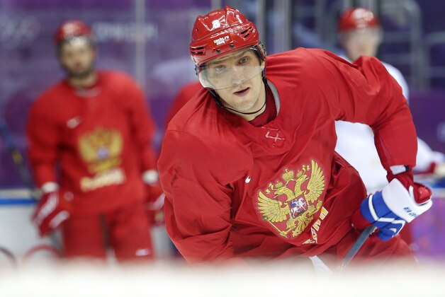 Russia forward Alexander Ovechkin approaches the goal for a shot during a  training session at the Bolshoy Ice Dome at the the 2014 Winter Olympics, Tuesday, Feb. 11, 2014, in Sochi, Russia. (AP Photo/Julio Cortez)