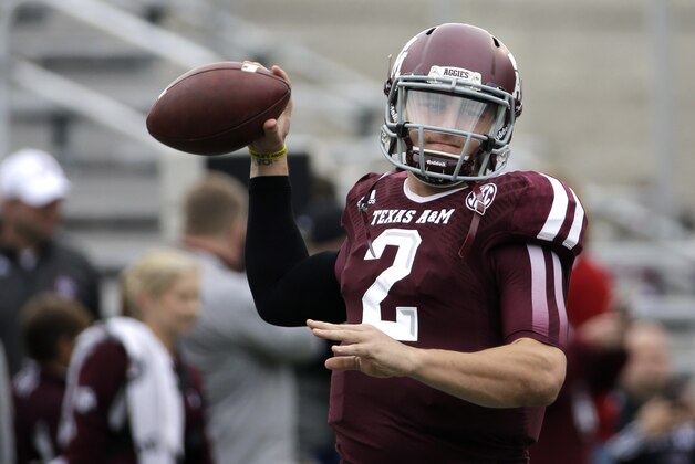 Texas A&M quarterback Johnny Manziel warms up before an NCAA college football game against Mississippi State Saturday, Nov. 9, 2013, in College Station, Texas. (AP Photo/David J. Phillip)