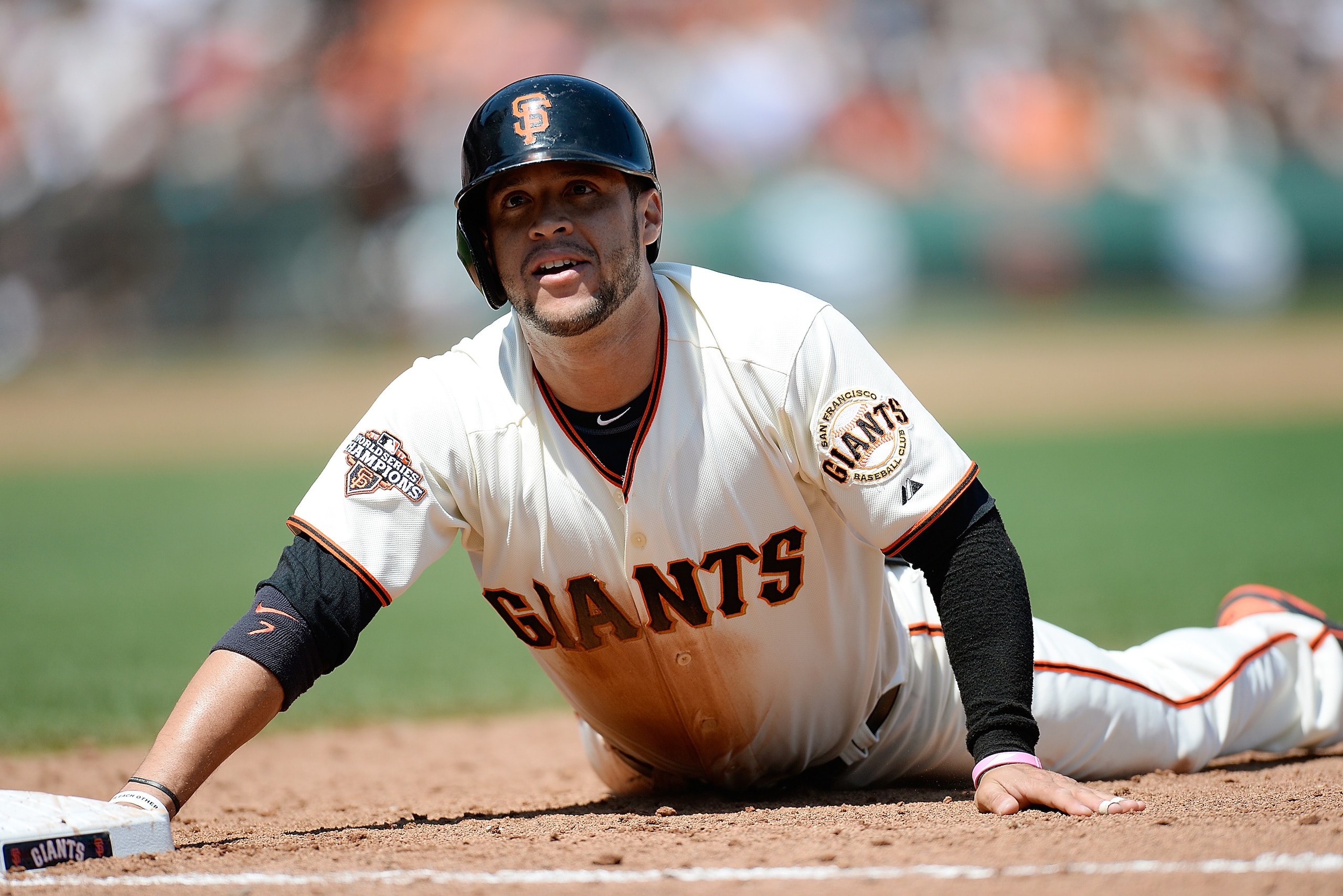 SAN FRANCISCO, CA - AUGUST 08:  Gregor Blanco #7 of the San Francisco Giants reacts after he was doubled off of first base on a failed sacrifice bunt attempt from Tim Lincecum #55 in the six inning against the Milwaukee Brewers at AT&T Park on August 8, 2013 in San Francisco, California.  (Photo by Thearon W. Henderson/Getty Images)