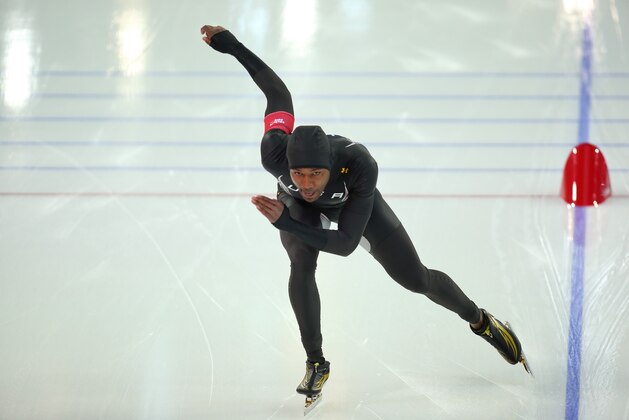 SOCHI, RUSSIA - FEBRUARY 10:  Shani Davis of the United States competes during the Men's 500 m Race 2 of 2 Speed Skating event during day 3 of the Sochi 2014 Winter Olympics at Adler Arena Skating Center on February 10, 2014 in Sochi, Russia.  (Photo by Quinn Rooney/Getty Images)