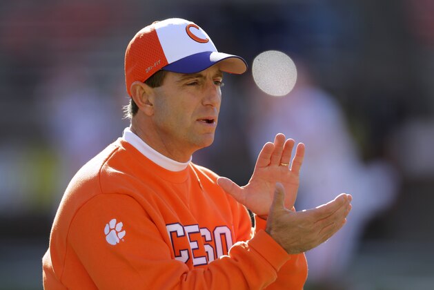 Clemson head coach Dabo Swinney walks on the field before an NCAA college football game against Maryland in College Park, Md., Saturday, Oct. 26, 2013. (AP Photo/Patrick Semansky)