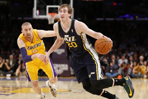 Utah Jazz's Gordon Hayward, right, drives past Los Angeles Lakers' Steve Blake, left, during the first half of an NBA basketball game in Los Angeles, Tuesday, Feb. 11, 2014. (AP Photo/Danny Moloshok) Utah Jazz's Gordon Hayward, right, drives past Los Angeles Lakers' Steve Blake, left, during the first half of an NBA basketball game in Los Angeles, Tuesday, Feb. 11, 2014. (AP Photo/Danny Moloshok)