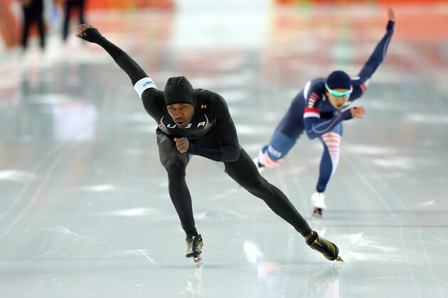 SOCHI, RUSSIA - FEBRUARY 10:  Shani Davis (L) of the United States competes during the Men's 500 m Race 1 of 2 Speed Skating event during day 3 of the Sochi 2014 Winter Olympics at Adler Arena Skating Center on February 10, 2014 in Sochi, Russia.  (Photo by Quinn Rooney/Getty Images)