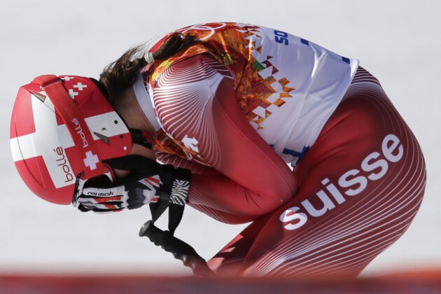 Switzerland's Dominique Gisin reacts after a women's downhill training run for the Sochi 2014 Winter Olympics, Friday, Feb. 7, 2014, in Krasnaya Polyana, Russia. (AP Photo/Gero Breloer)