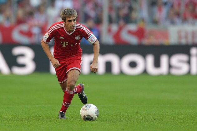 Bayern's Philipp Lahm controls the ball during the German first division Bundesliga soccer match between FC Bayern Munich and FSV Mainz 05, in Munich, southern Germany, Saturday, Oct. 19, 2013. (AP Photo/Matthias Schrader)