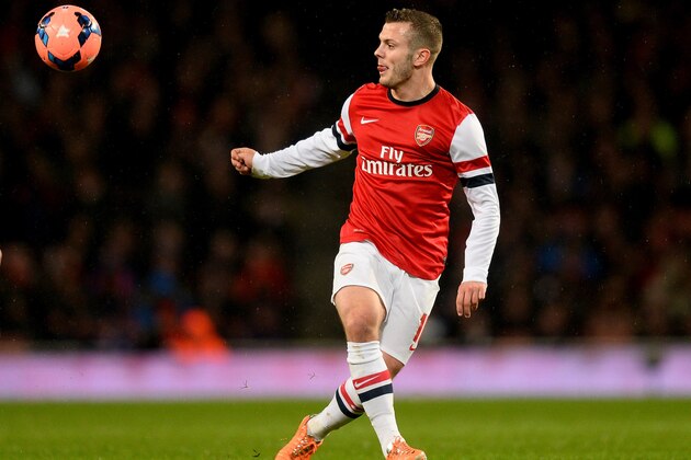 LONDON, ENGLAND - JANUARY 24:  Jack Wilshere of Arsenal in action during the FA Cup with Budweiser Fourth round match between Arsenal and Coventry City at Emirates Stadium on January 24, 2014 in London, England.  (Photo by Mike Hewitt/Getty Images)