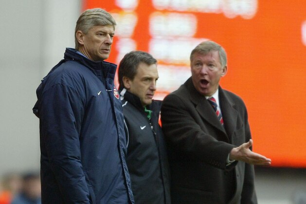 LONDON - MARCH 28:  Manager Arsene Wenger of Arsenal argues with manager Sir Alex Ferguson of Manchester United during the FA Barclaycard Premiership match between Arsenal and Manchester United at Highbury on March 28, 2004 in London.  (Photo by Clive Mason/Getty Images)