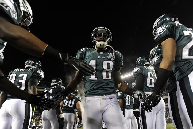 Philadelphia Eagles wide receiver Jeremy Maclin (18) is greeted by team mates during introductions before an NFL football game against the Cincinnati Bengals, Thursday, Dec. 13, 2012, in Philadelphia. (AP Photo/Michael Perez)