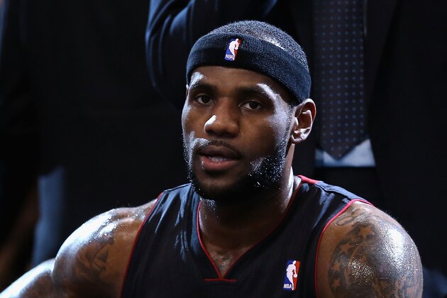 PHOENIX, AZ - FEBRUARY 11:  LeBron James #6 of the Miami Heat sits on the bench during a break from the NBA game against the Phoenix Suns at US Airways Center on February 11, 2014 in Phoenix, Arizona.  NOTE TO USER: User expressly acknowledges and agrees that, by downloading and or using this photograph, User is consenting to the terms and conditions of the Getty Images License Agreement.  (Photo by Christian Petersen/Getty Images)