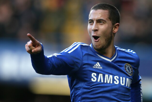 Chelsea's Eden Hazard celebrates after scoring  the opening goal against lNewcastle during their English Premier League soccer match between Chelsea and Newcastle United in London Saturday, Feb. 8, 2014. (AP Photo/Alastair Grant)