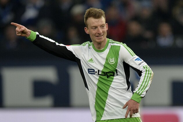 Wolfsburg's Maximilian Arnold celebrates his goal during the German Bundesliga soccer match between FC Schalke 04 and VfL Wolfsburg in Gelsenkirchen,  Germany, Saturday, Feb. 1, 2014. (AP Photo/Martin Meissner)