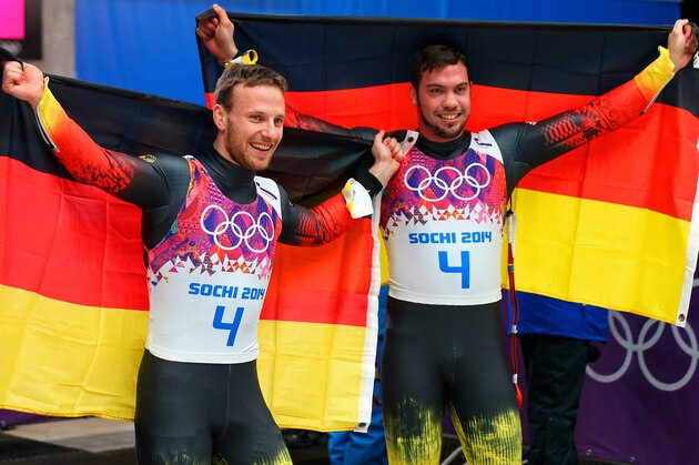 SOCHI, RUSSIA - FEBRUARY 12:  Tobias Wendl (R) and Tobias Arlt of Germany celebrate after winning the gold medal during the Men's Luge Doubles on Day 5 of the Sochi 2014 Winter Olympics at Sliding Center Sanki on February 12, 2014 in Sochi, Russia.  (Photo by Alex Livesey/Getty Images)