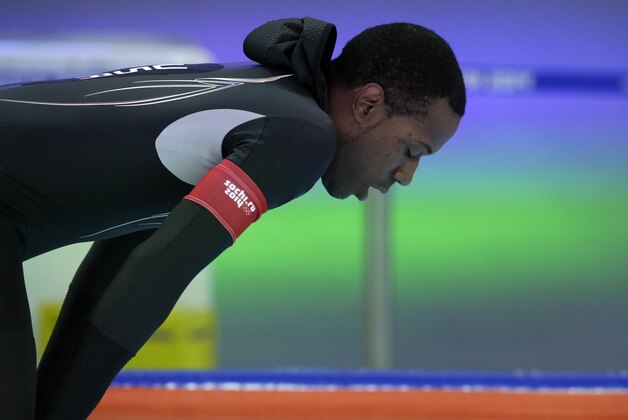 Shani Davis of the U.S. takes a breather after competing in the men's 1,000-meter speedskating race at the Adler Arena Skating Center during the 2014 Winter Olympics in Sochi, Russia, Wednesday, Feb. 12, 2014. (AP Photo/Matt Dunham)