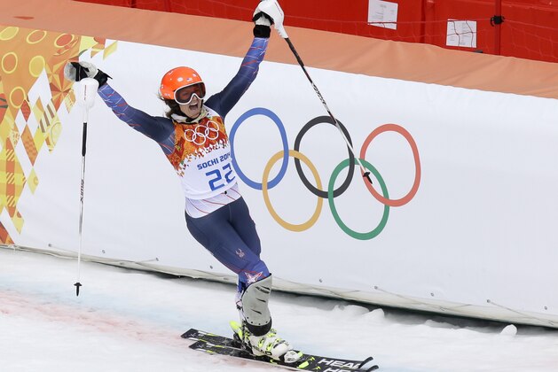 United States' Julia Mancuso celebrates as finishes the slalom portion of the women's supercombined to win the bronze medal at the Sochi 2014 Winter Olympics, Monday, Feb. 10, 2014, in Krasnaya Polyana, Russia. (AP Photo/Luca Bruno)