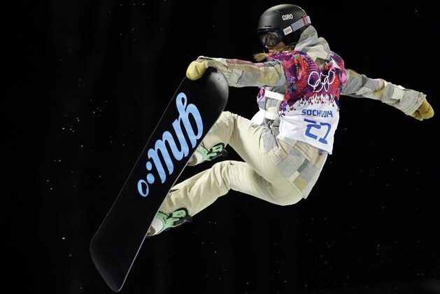 United States' Kaitlyn Farrington competes  during the women's snowboard halfpipe semifinal at the Rosa Khutor Extreme Park, at the 2014 Winter Olympics, Wednesday, Feb. 12, 2014, in Krasnaya Polyana, Russia. (AP Photo/Felipe Dana)