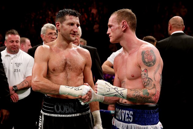 MANCHESTER, ENGLAND - NOVEMBER 23:  Carl Froch shakes hands with George Groves during their IBF and WBA World Super Middleweight bout at Phones4u Arena on November 23, 2013 in Manchester, England.  (Photo by Scott Heavey/Getty Images)
