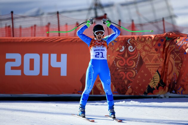 SOCHI, RUSSIA - FEBRUARY 12:  Tina Maze of Slovenia celebrates after her run during the Alpine Skiing Women's Downhill on day 5 of the Sochi 2014 Winter Olympics at Rosa Khutor Alpine Center on February 12, 2014 in Sochi, Russia.  (Photo by Richard Heathcote/Getty Images)