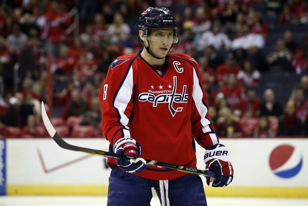 Washington Capitals right wing Alex Ovechkin (8), from Russia, skates on the ice in the first period of an NHL hockey game against the Detroit Red Wings, Sunday, Feb. 2, 2014, in Washington. (AP Photo/Alex Brandon)