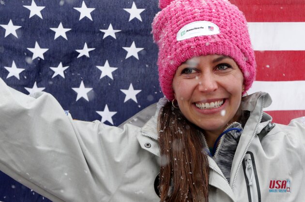 Noelle Pikus-Pace of the United States  celebrates after winning the women's Skeleton World Cup race in Koenigssee, southern Germany, on Friday, Jan. 24, 2014. (AP Photo/Matthias Schrader)