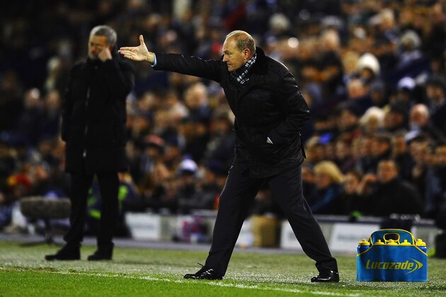 WEST BROMWICH, ENGLAND - FEBRUARY 11:  Manager Pepe Mel of West Brom gestures as Jose Mourinho of Chelsea looks on during the Barclays Premier League match between West Bromwich Albion and Chelsea at The Hawthorns on February 11, 2014 in West Bromwich, England.  (Photo by Laurence Griffiths/Getty Images)