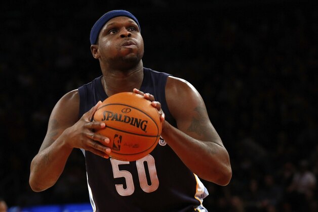 Dec 21, 2013; New York, NY, USA;  Memphis Grizzlies power forward Zach Randolph (50) shoots a free throw during the first quarter against the New York Knicks at Madison Square Garden. Mandatory Credit: Anthony Gruppuso-USA TODAY Sports