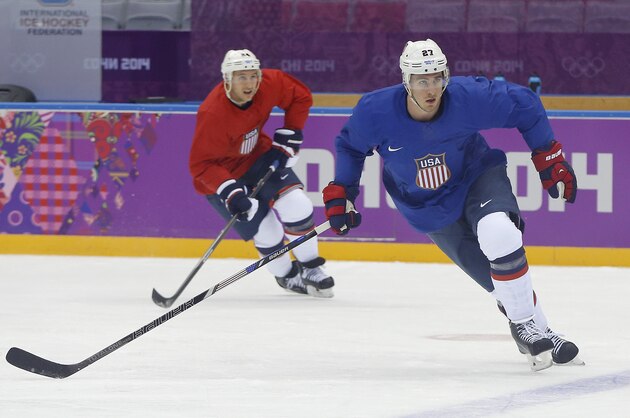 USA defenseman Ryan McDonagh, right, and forward Ryan Callahan run through a drill during a training session at the 2014 Winter Olympics, Monday, Feb. 10, 2014, in Sochi, Russia. (AP Photo/Julie Jacobson)