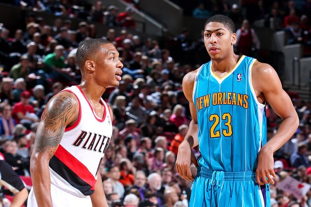 PORTLAND, OR - DECEMBER 16: Anthony Davis #23 of the New Orleans Hornets speaks with Damian Lillard #0 of the Portland Trail Blazers before resuming action in their game on December 16, 2012 at the Rose Garden Arena in Portland, Oregon. NOTE TO USER: User expressly acknowledges and agrees that, by downloading and or using this photograph, user is consenting to the terms and conditions of the Getty Images License Agreement. Mandatory Copyright Notice: Copyright 2012 NBAE (Photo by Sam Forencich/NBAE via Getty Images)